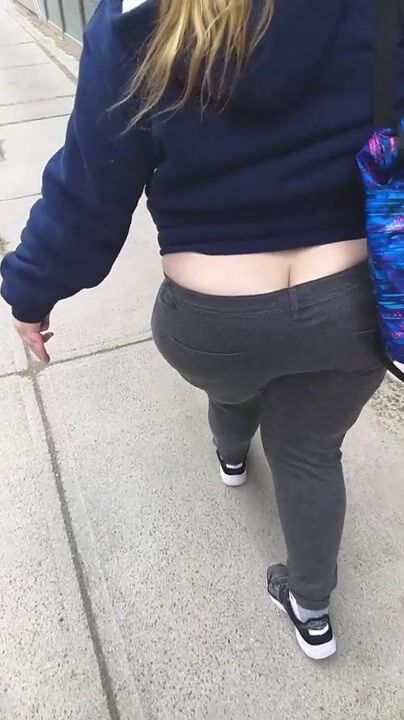 Booty hanging out of jeans lol. I know she could feel the breeze