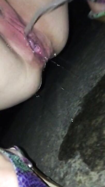 Wife pissing more for some guys at a loading dock